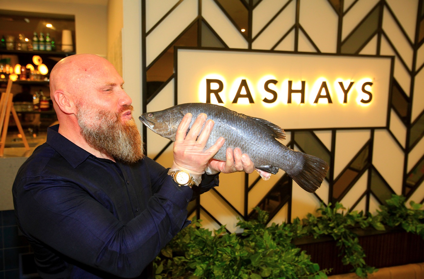 Eatery chain owner adds local Barra fish to menu to help ...