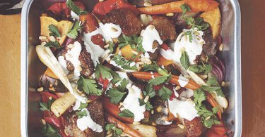 Spiced Lamb and Winter Vegetable Tray Bake with Yogurt, Pine nuts and Herbs